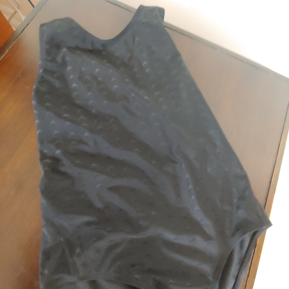 This product is a stylish black one-piece swimwear with a wing design racer back